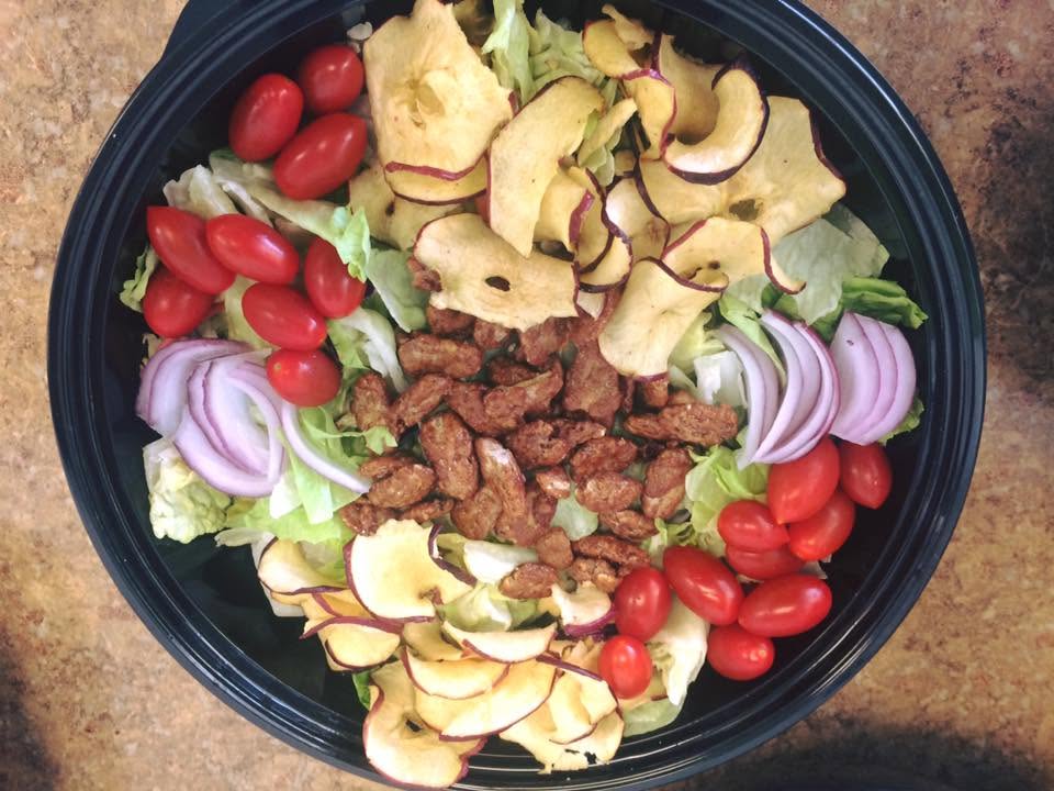 Fuji apple salad with apple chips, pecans, tomatoes and red onion